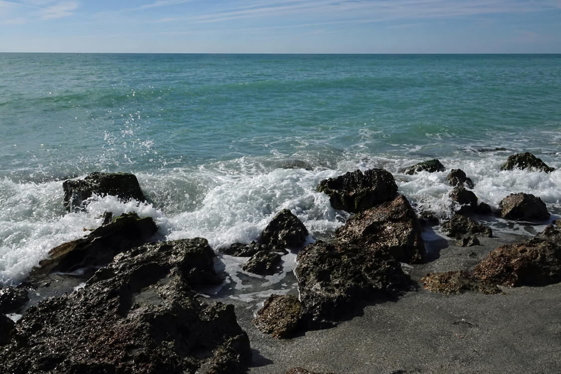 Waves breaking on limestone rocks- Caspersen Beach, Venice, FL