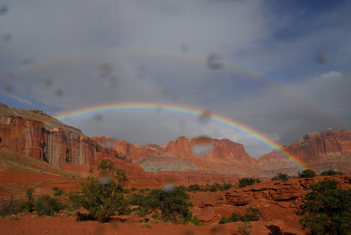 Raindrops, red rock, and rainbow  -  Capitol Reef National Park, Utah