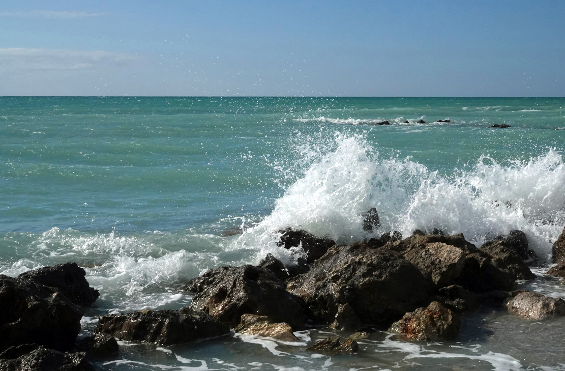 Waves breaking on limestone rocks  -  Caspersen Beach, Venice, Florida  
