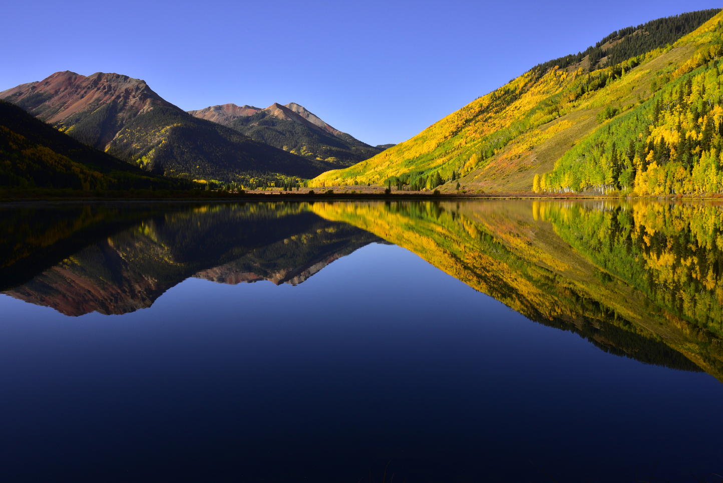 Red Mountains (left, center), fall colors on Hayden Mountain (right), reflection in Crystal Lake  -  Uncompahgre National Forest, Colorado