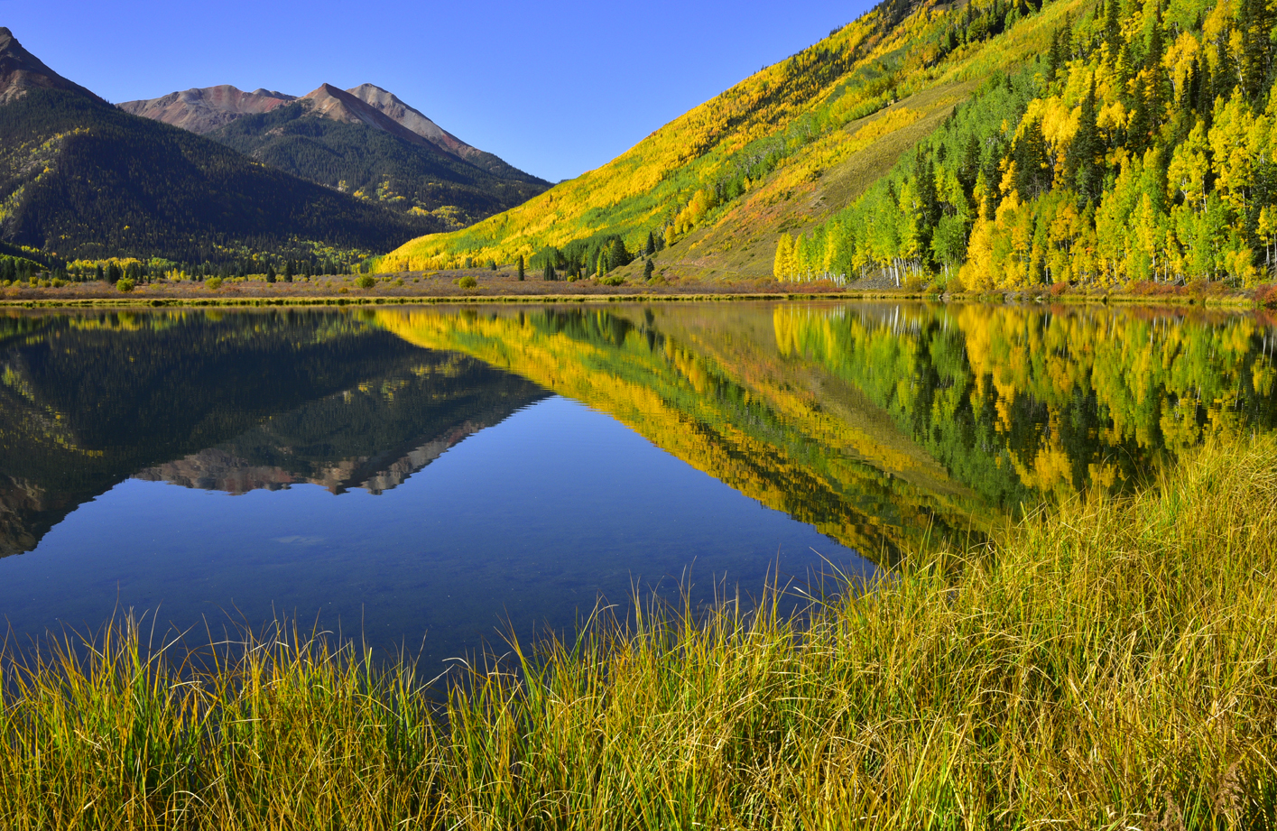 Red Mountains (left), fall colors on Hayden Mountain (center, right), reflection in Crystal Lake  -  Uncompahgre National Forest, Colorado
