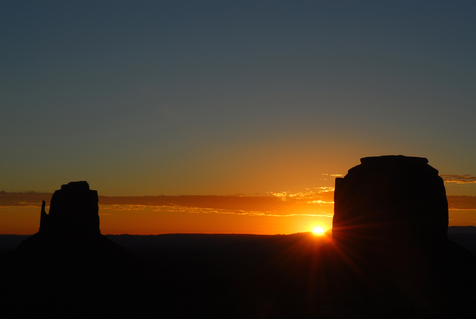 Sunrise at Merrick Butte (right), East Mitten Butte (left)  -  Monument Valley Navajo Tribal Park, Arizona