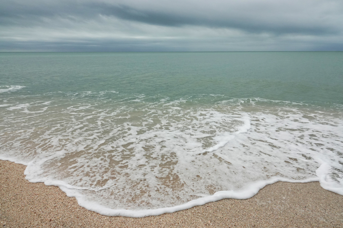 Gulf of Mexico shoreline, approaching storm clouds  -  Nokomis Beach, Nokomis, Florida