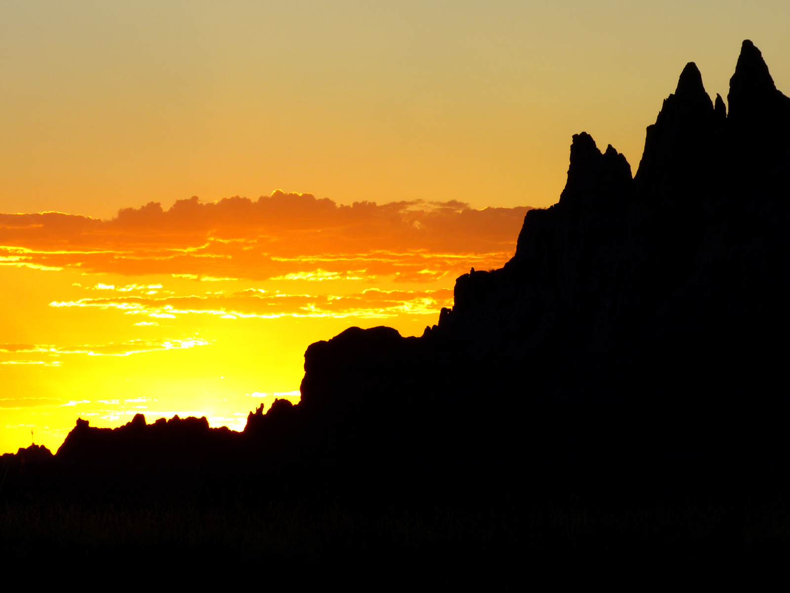 Sunset  -  Post-sunset light and silhouette, Badlands National Park, South Dakota