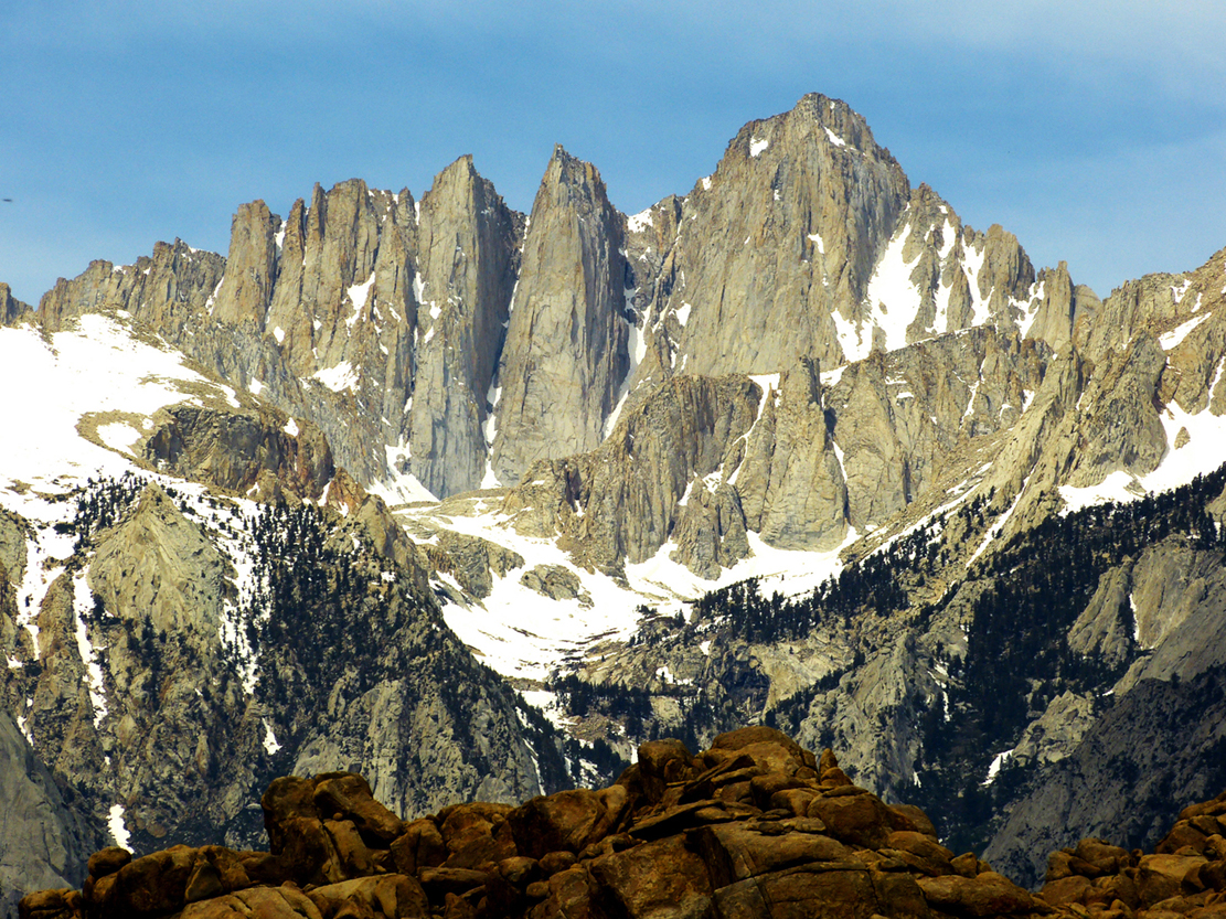 Mt. Whitney (right) at 14,505 feet is the highest point in the contiguous United States  -  from Arch Loop Trail, Alabama Hills Recreation Area, California