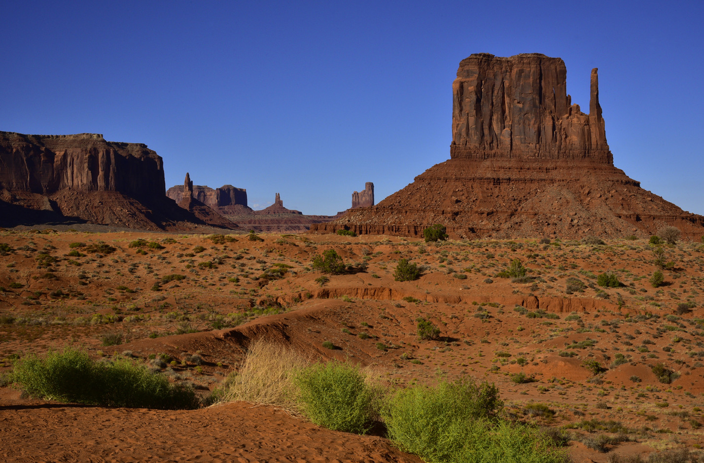 West Mitten Butte (right), other buttes, mesas, spires  -  Scenic Drive, Monument Valley, Arizona 